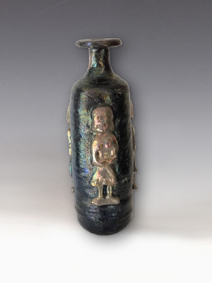 Artist: Beatrice Wood, Title: Tall Black Bottle with Three Gold Lustre Figures, c. 1984 - click for larger image