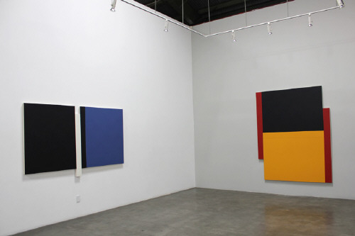 Artist: Scot Heywood, Title: Installation View left to right: Sunyata Black, Blue, White, 2012; Two Poles Red, Yellow, Blue, 2011 - click for larger image
